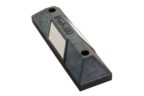 Rubber parking stopper with white reflector
