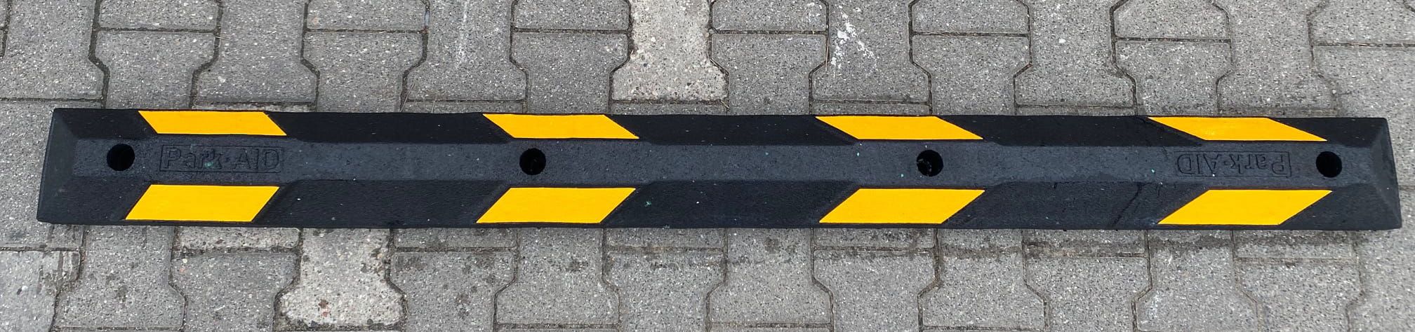 Rubber parking separator 1800x145x100 mm, yellow reflective tape